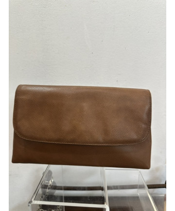 Pochette, busta in pelle...